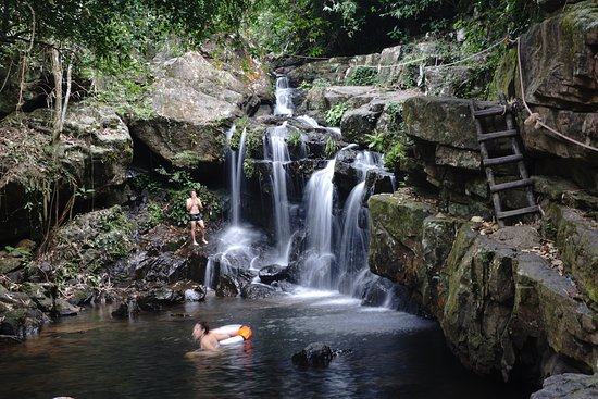 Natural waterfall swimming area at Phong Nha Botanical Garden