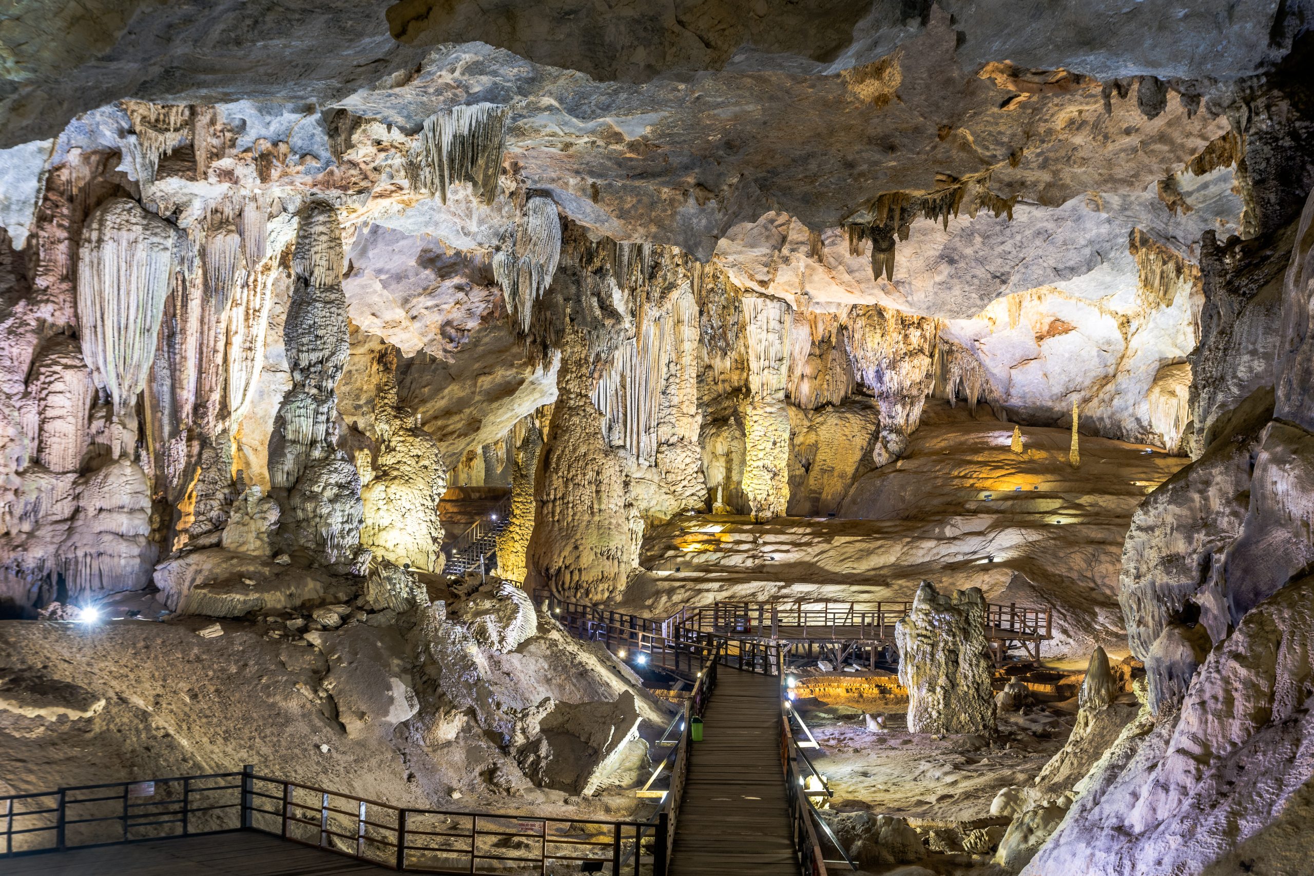Large illuminated chamber inside Paradise Cave in Phong Nha